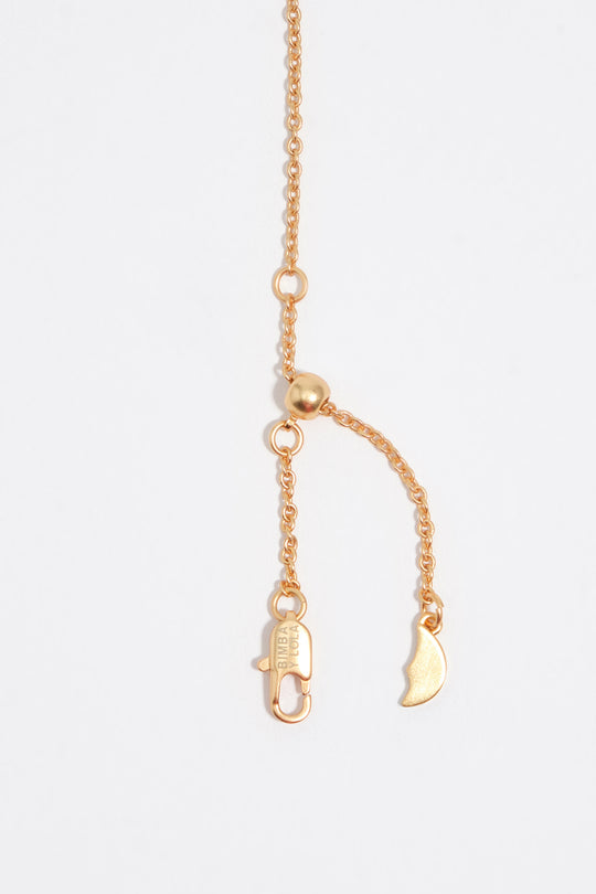 Brushed gold mother-of-pearl sun necklace