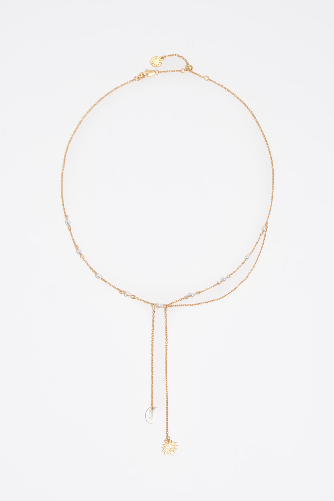 Sun and moon necklace with brushed gold chains