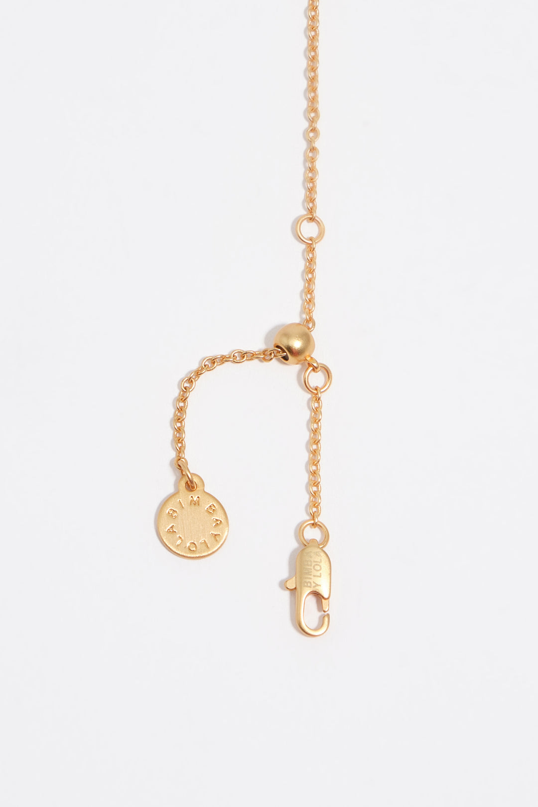 Sun and moon necklace with brushed gold chains