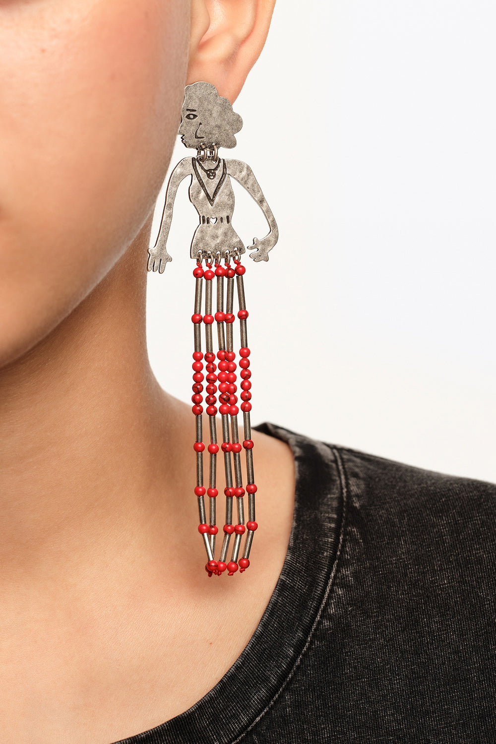 Aged silver metal silhouette and stones earrings