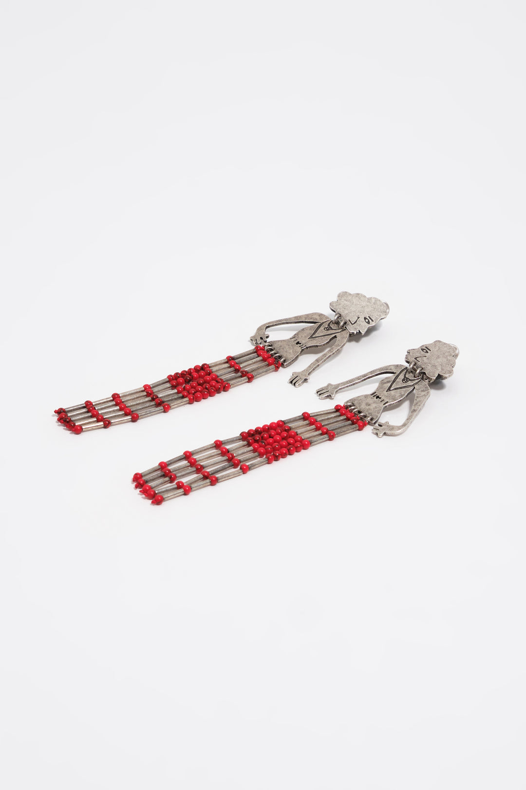 Aged silver metal silhouette and stones earrings
