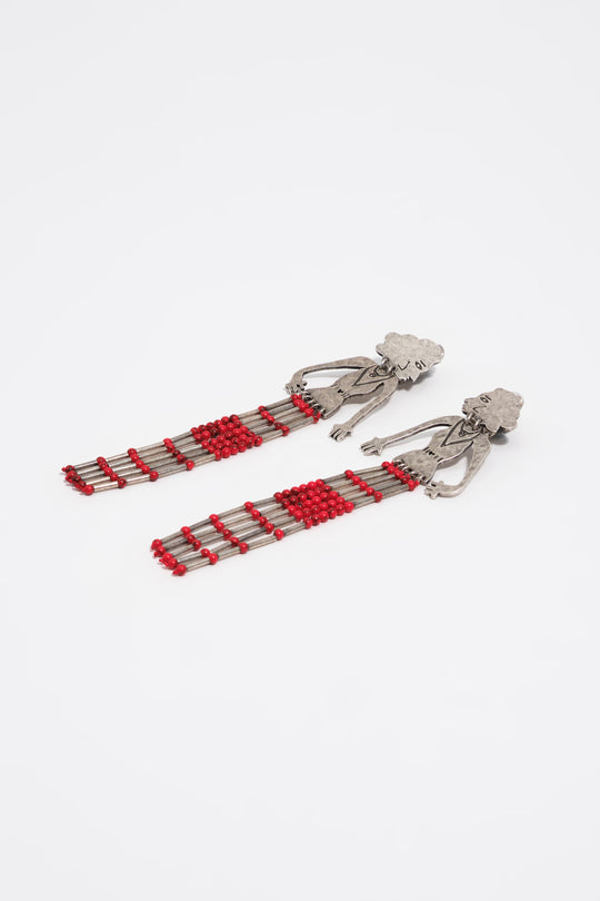 Aged silver metal silhouette and stones earrings