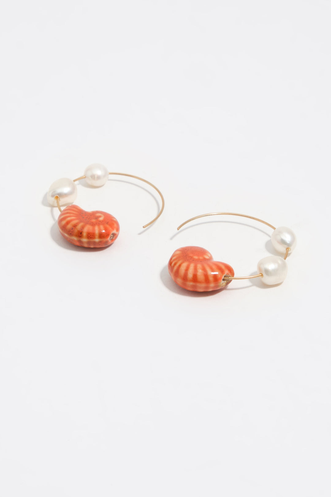 Hoop earrings with pearls and ceramic seashell