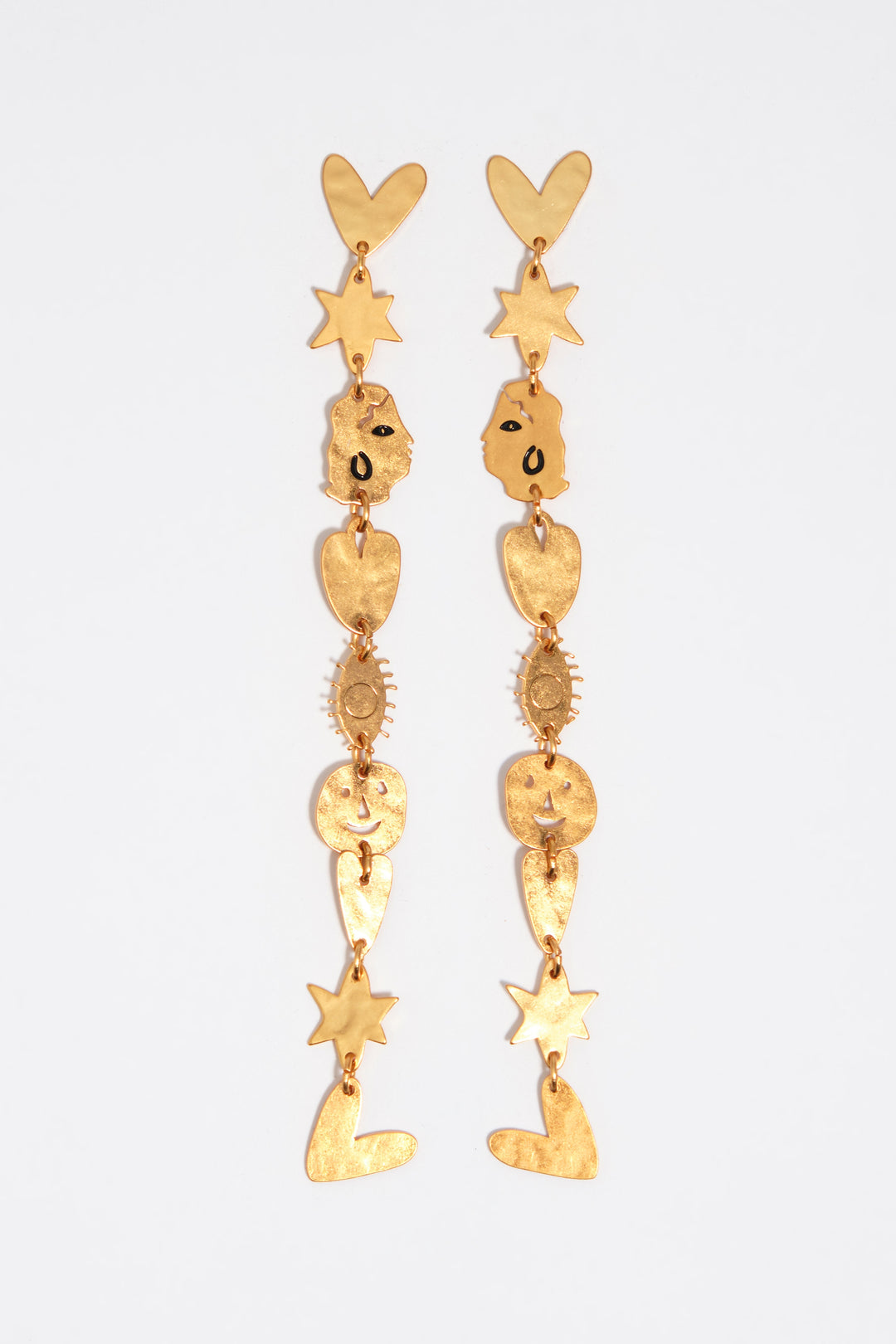 Matte gold metal silhouette earrings