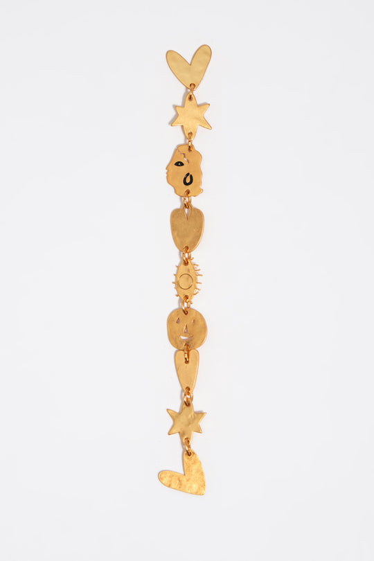 Matte gold metal silhouette earrings
