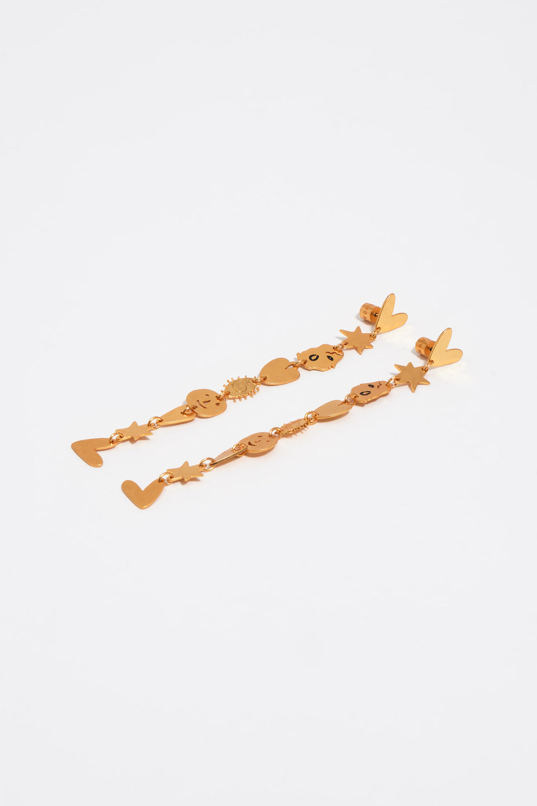 Matte gold metal silhouette earrings