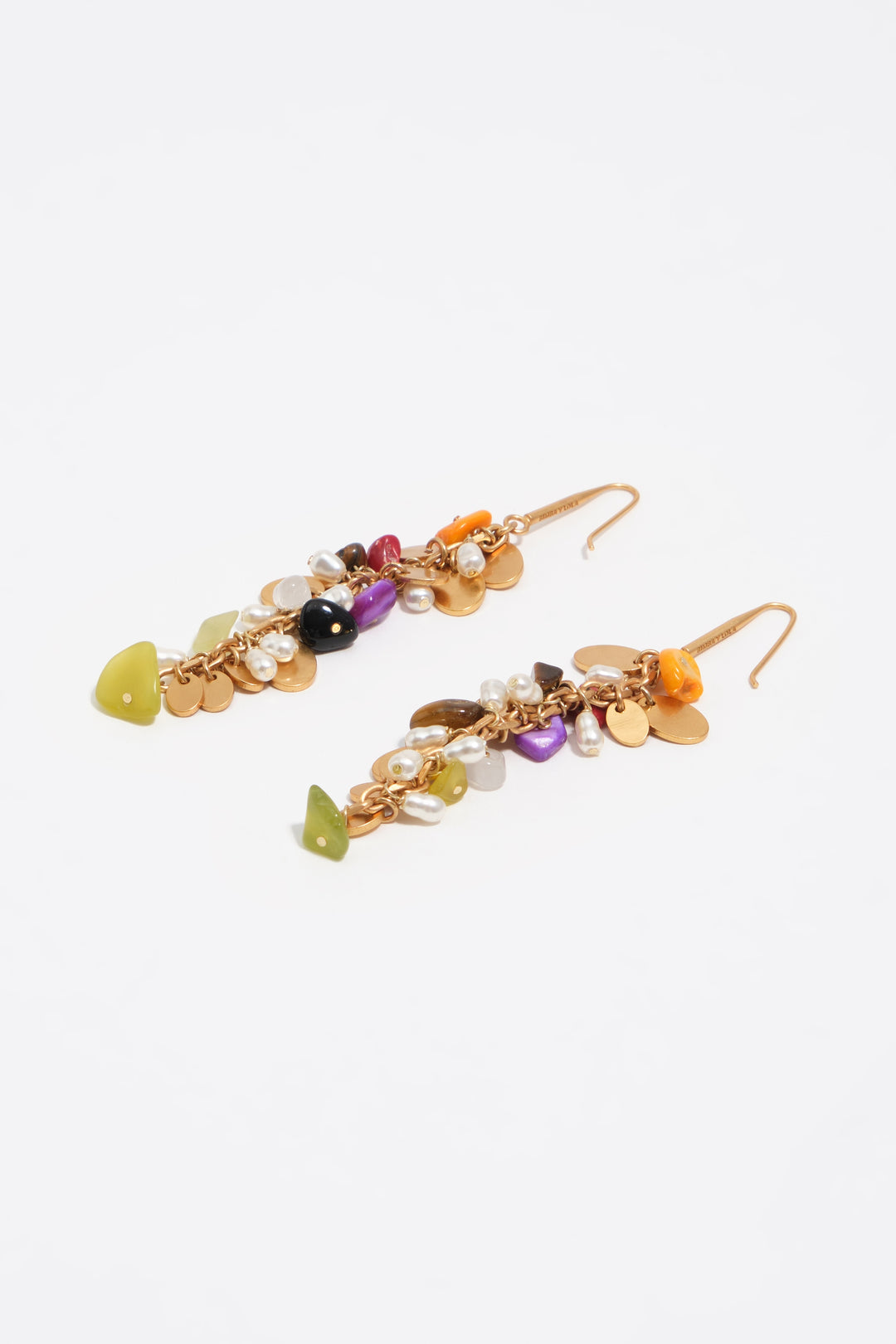 Earrings with stones and aged gold metal texture