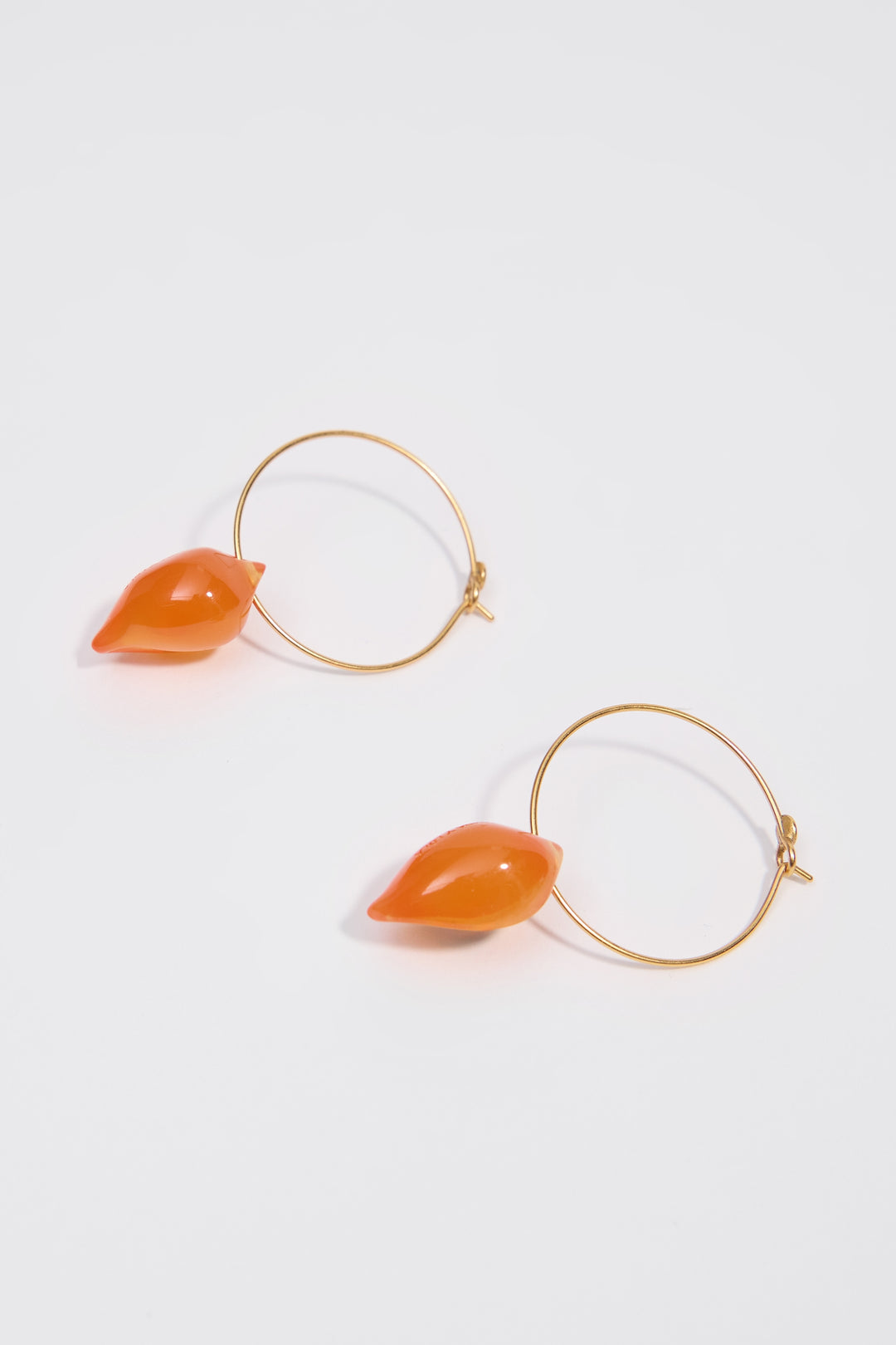 Orange resin seashell hoop earrings