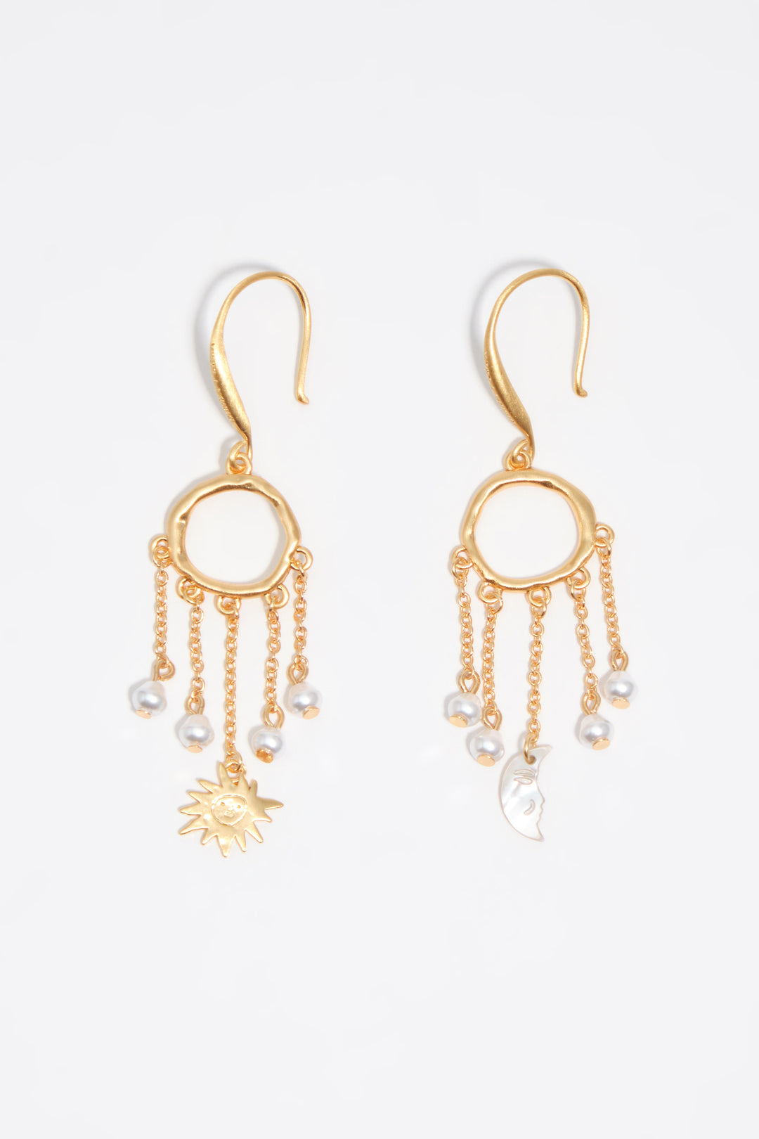 Sun and moon earrings with brushed gold chains and pearls