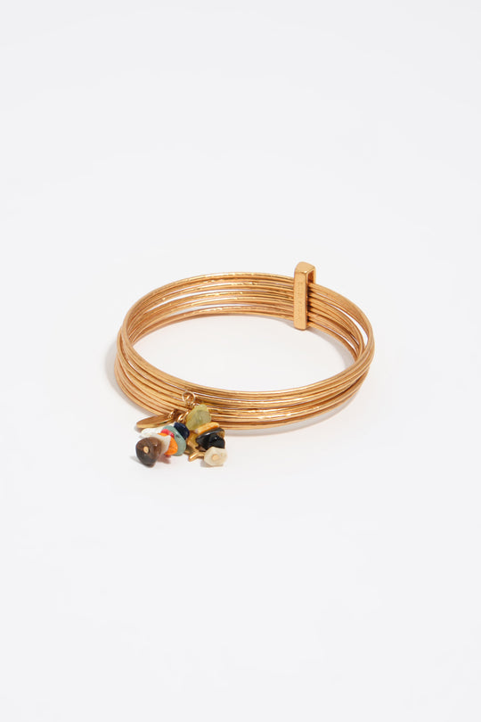 Bangle bracelet with aged gold stones texture