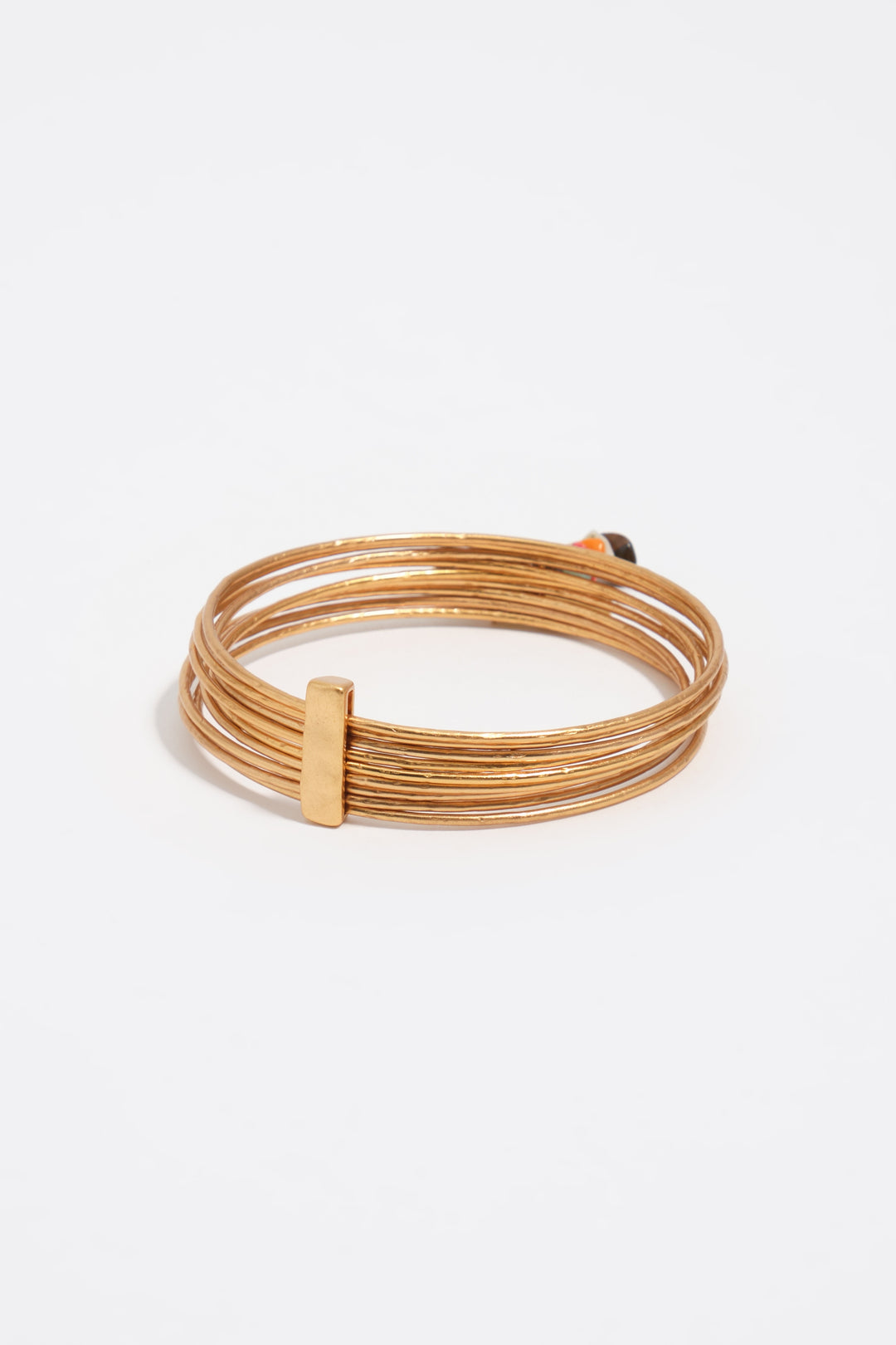 Bangle bracelet with aged gold stones texture