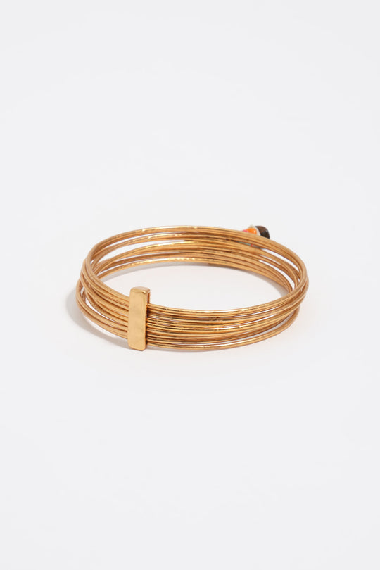 Bangle bracelet with aged gold stones texture