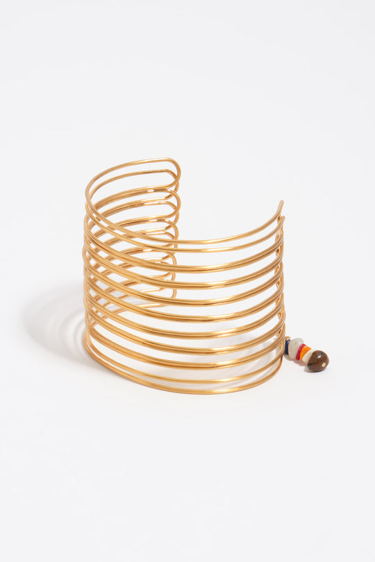 Forearm bracelet with bands in aged gold texture