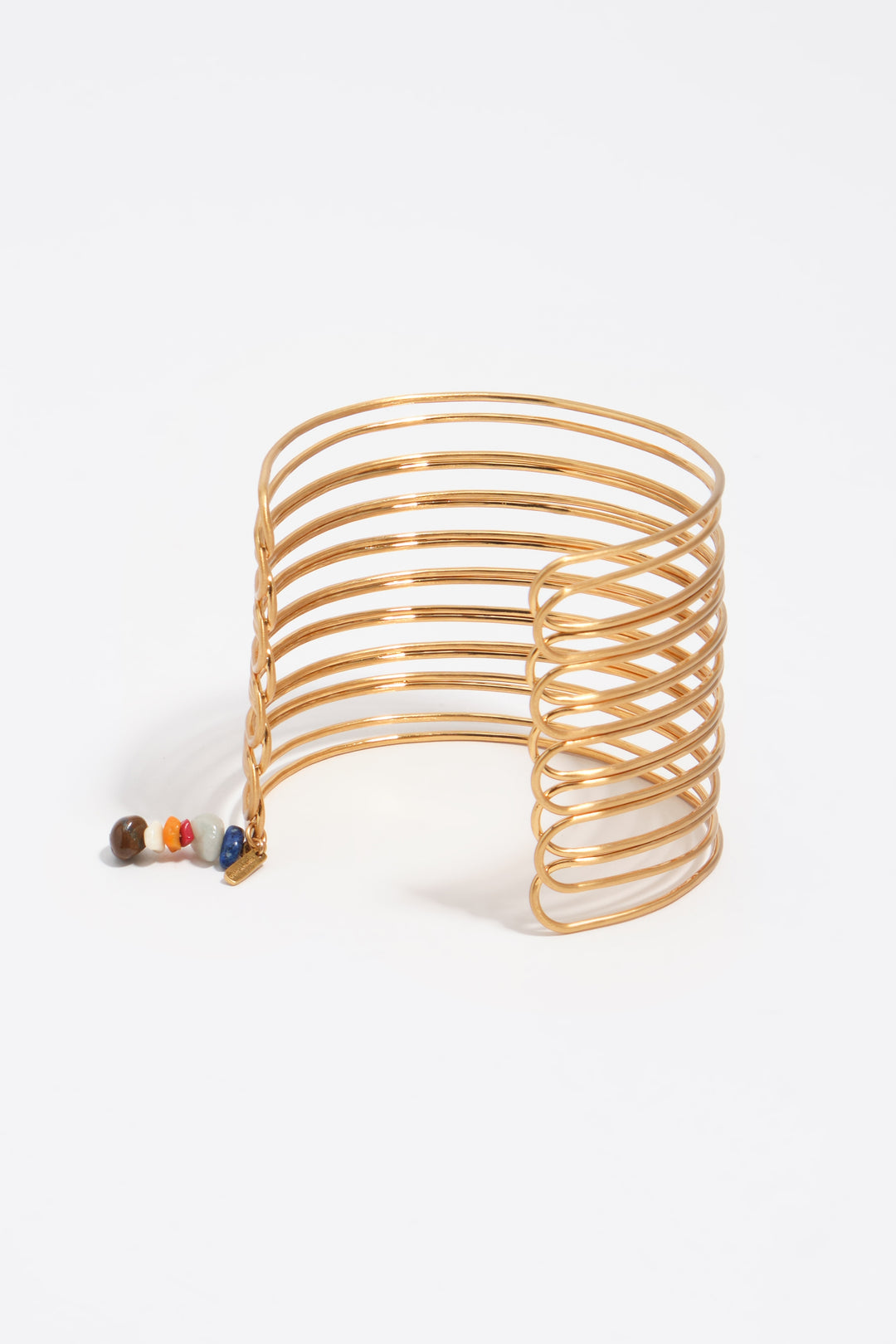 Forearm bracelet with bands in aged gold texture