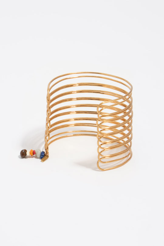 Forearm bracelet with bands in aged gold texture