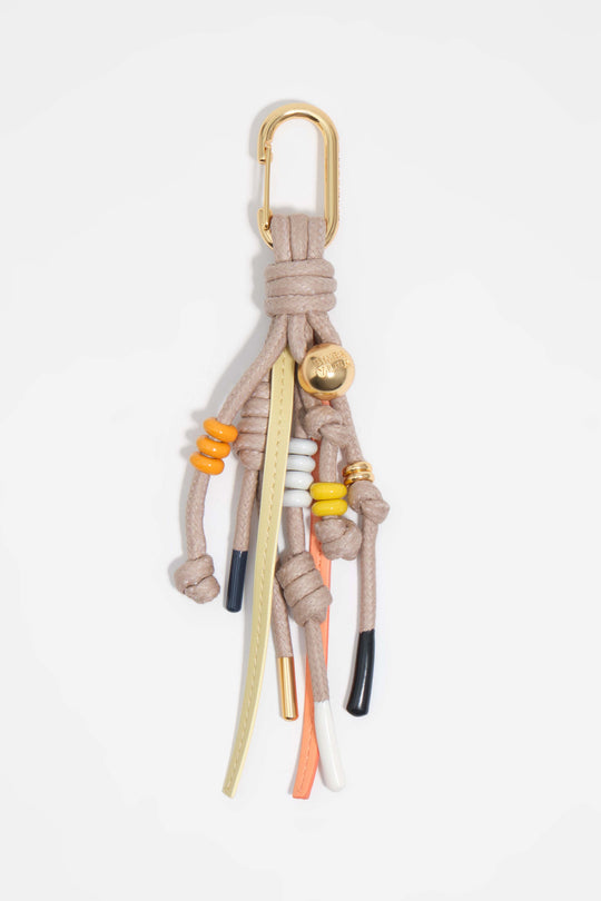 Pompom key ring with cords and beads