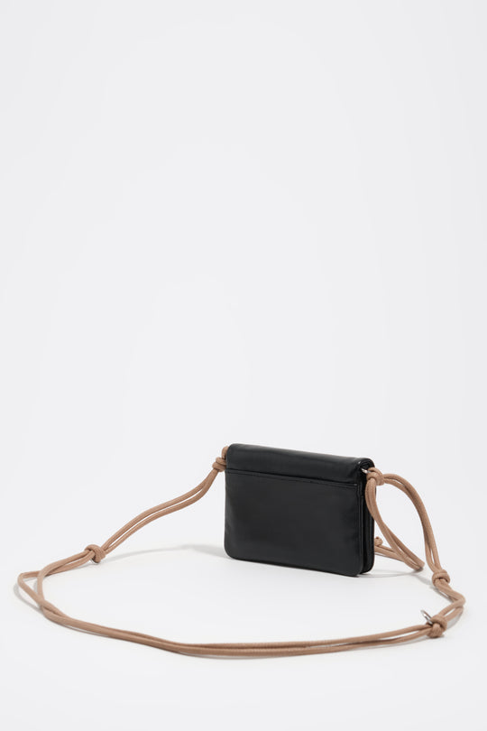 Small black leather flap purse