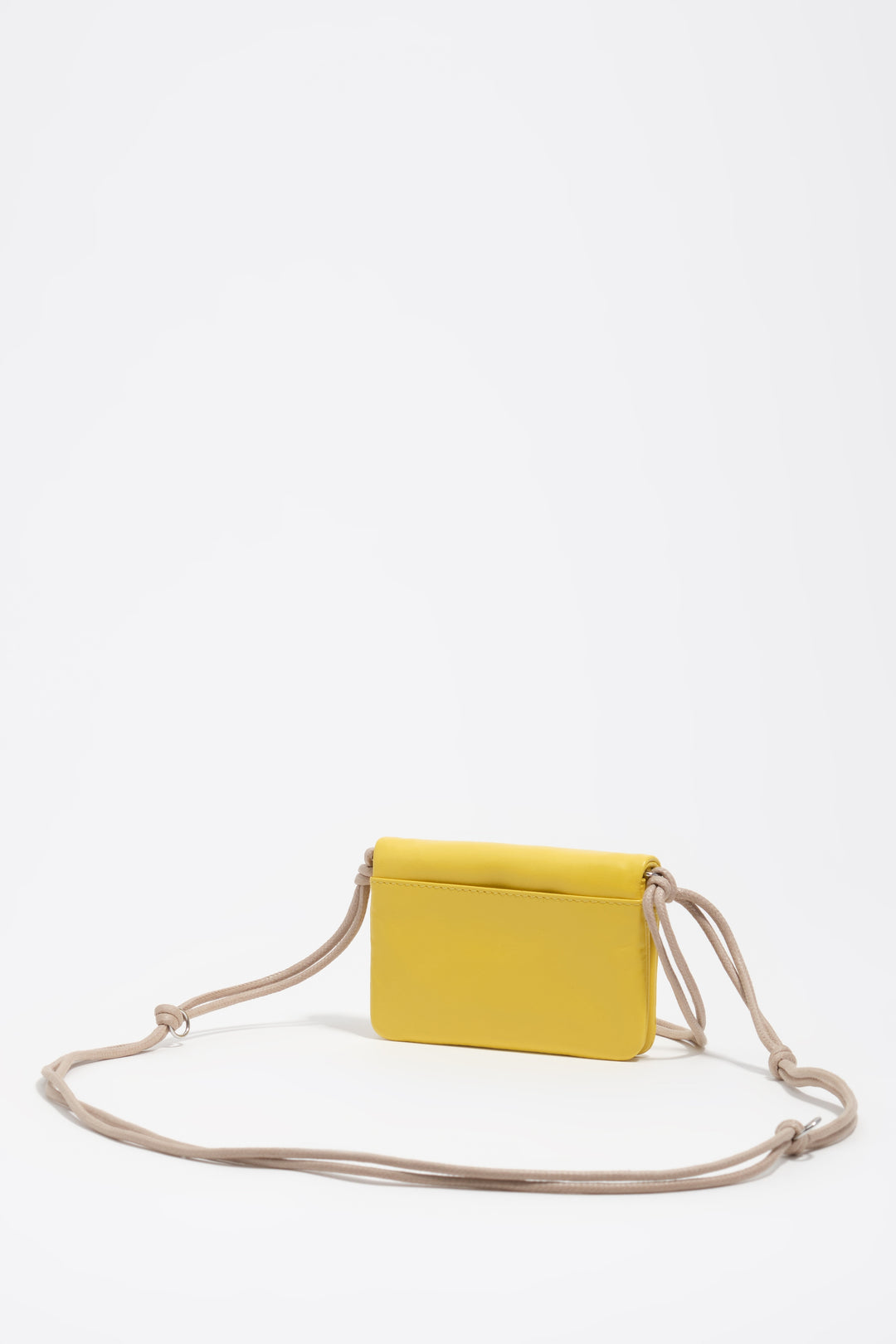 Small yellow leather flap purse