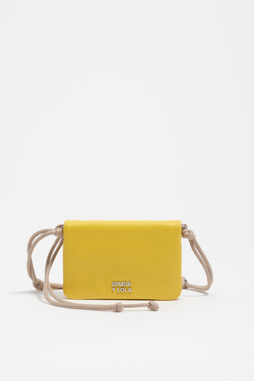 Small yellow leather flap purse