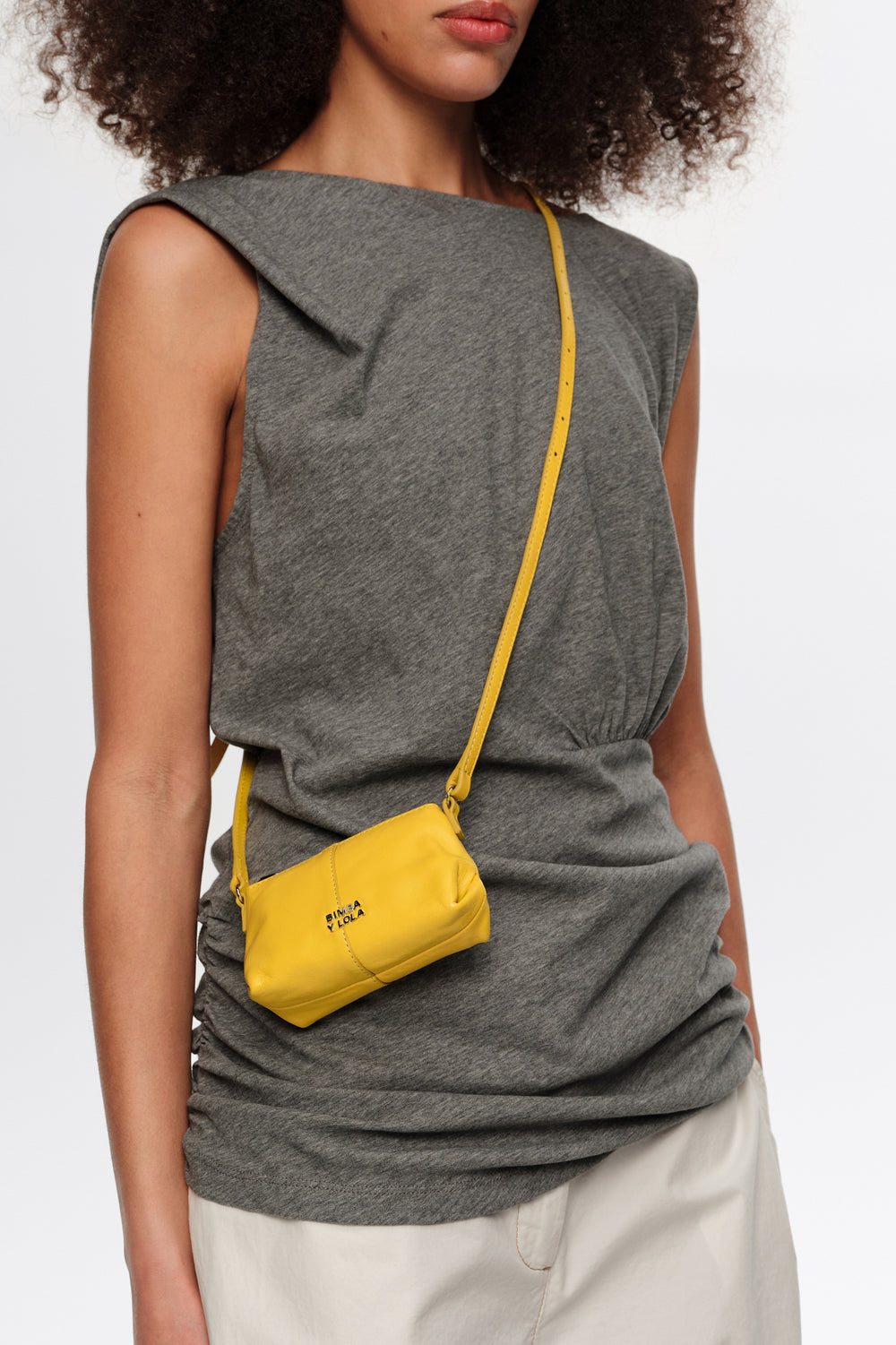 Micro yellow leather crossbody bag