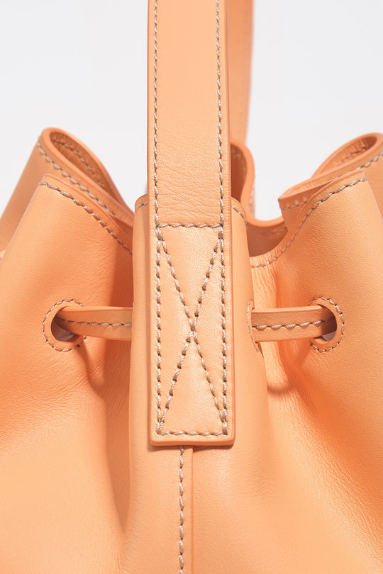 Large orange sorbet leather Carlino bucket bag