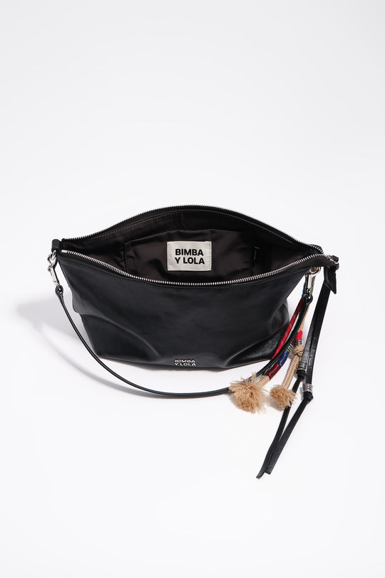 Medium black leather trapecio bag