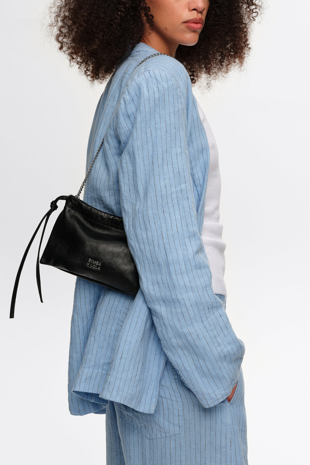 Mini black leather clutch bag