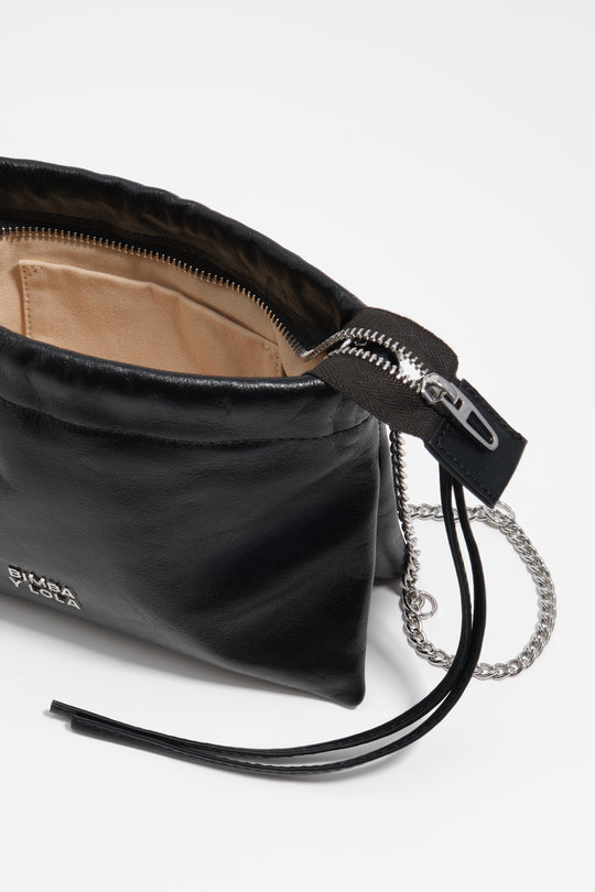 Mini black leather clutch bag