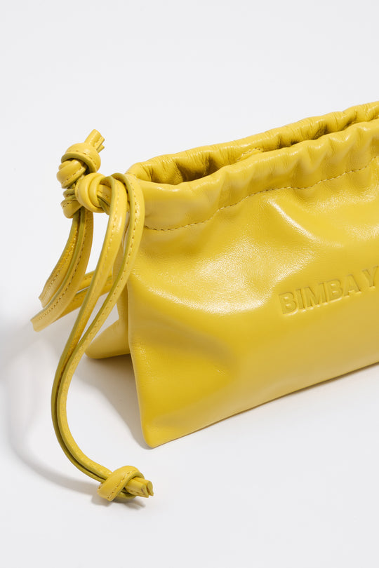 Mini yellow leather clutch bag
