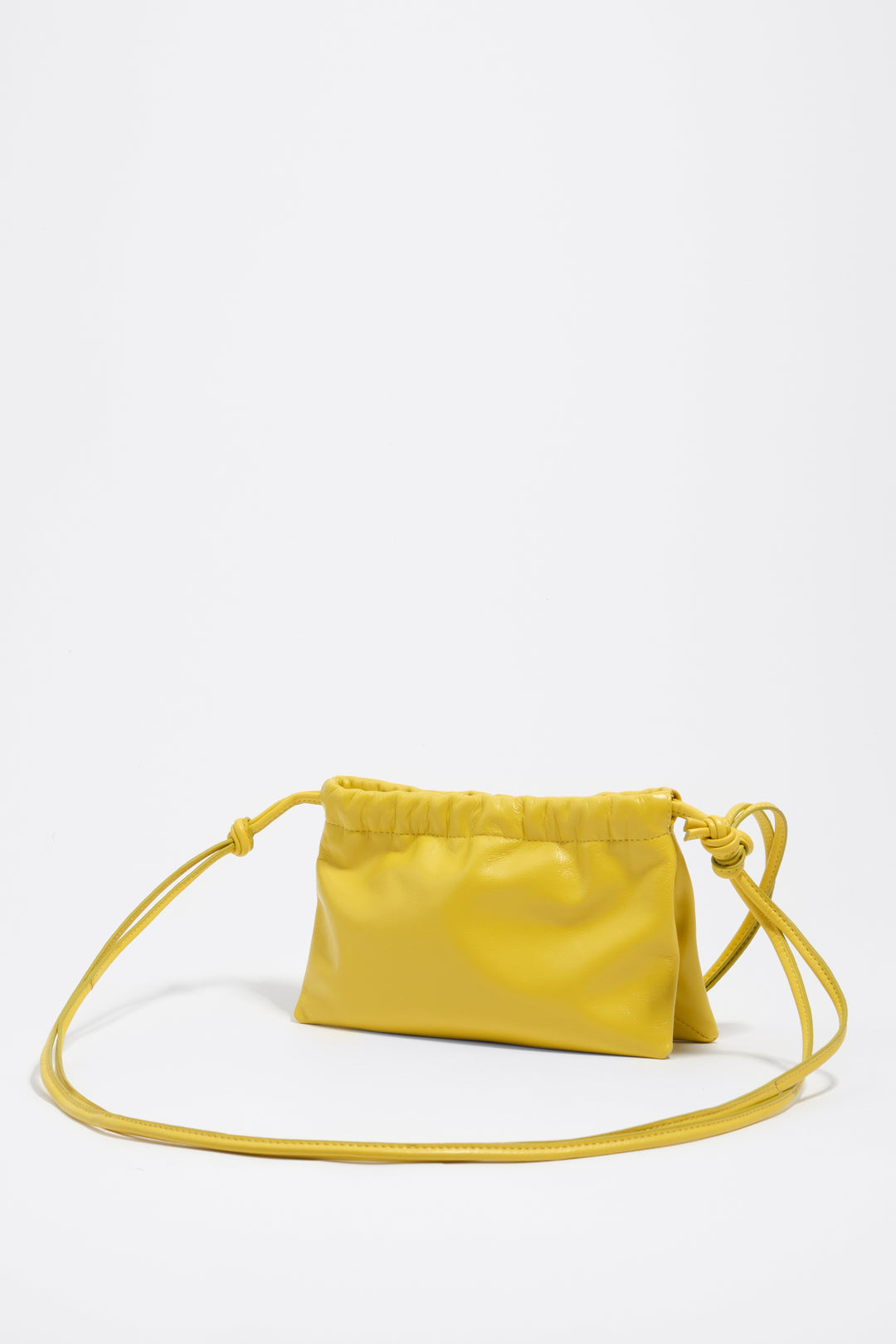Mini yellow leather clutch bag