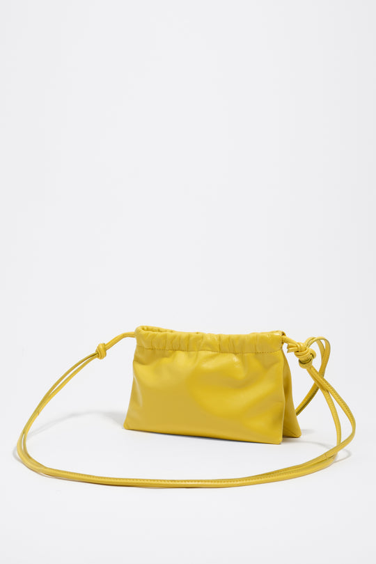 Mini yellow leather clutch bag