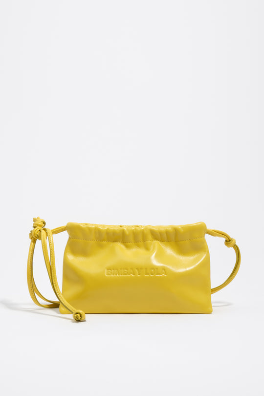 Mini yellow leather clutch bag