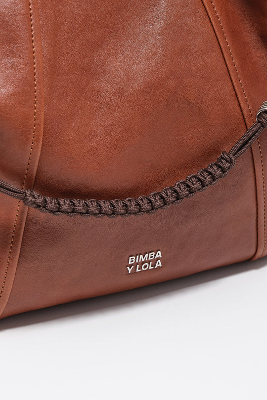 Medium dark tan leather Paper bag