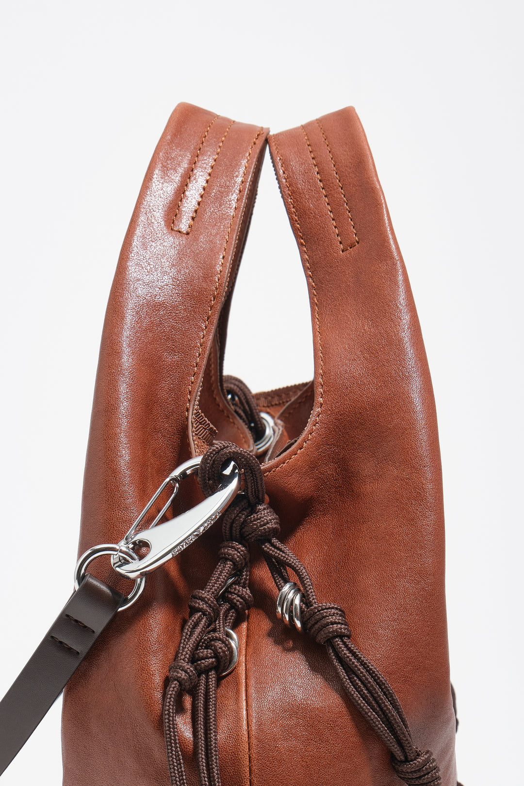 Medium dark tan leather Paper bag
