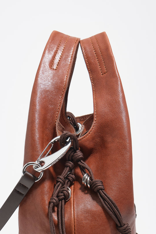 Medium dark tan leather Paper bag