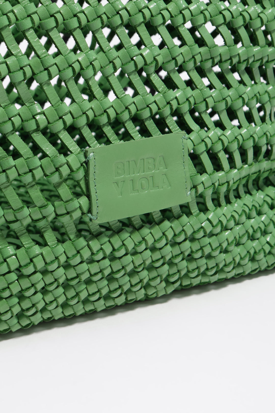 Large emerald plaited leather shopper bag