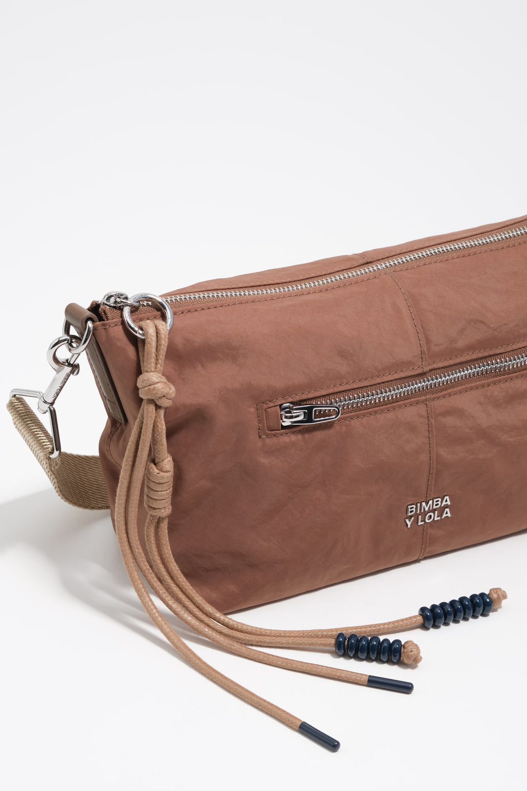 Tan nylon small trapecio bag