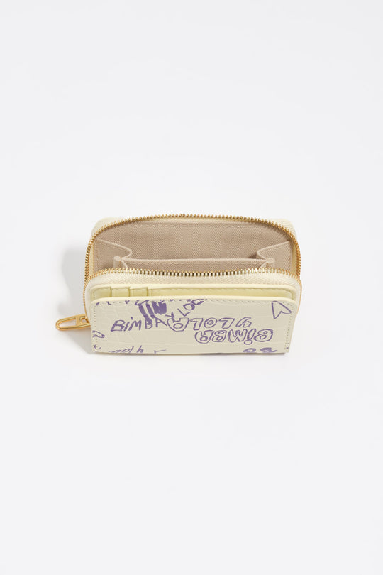 Yellow and purple flap purse with Bimba logo