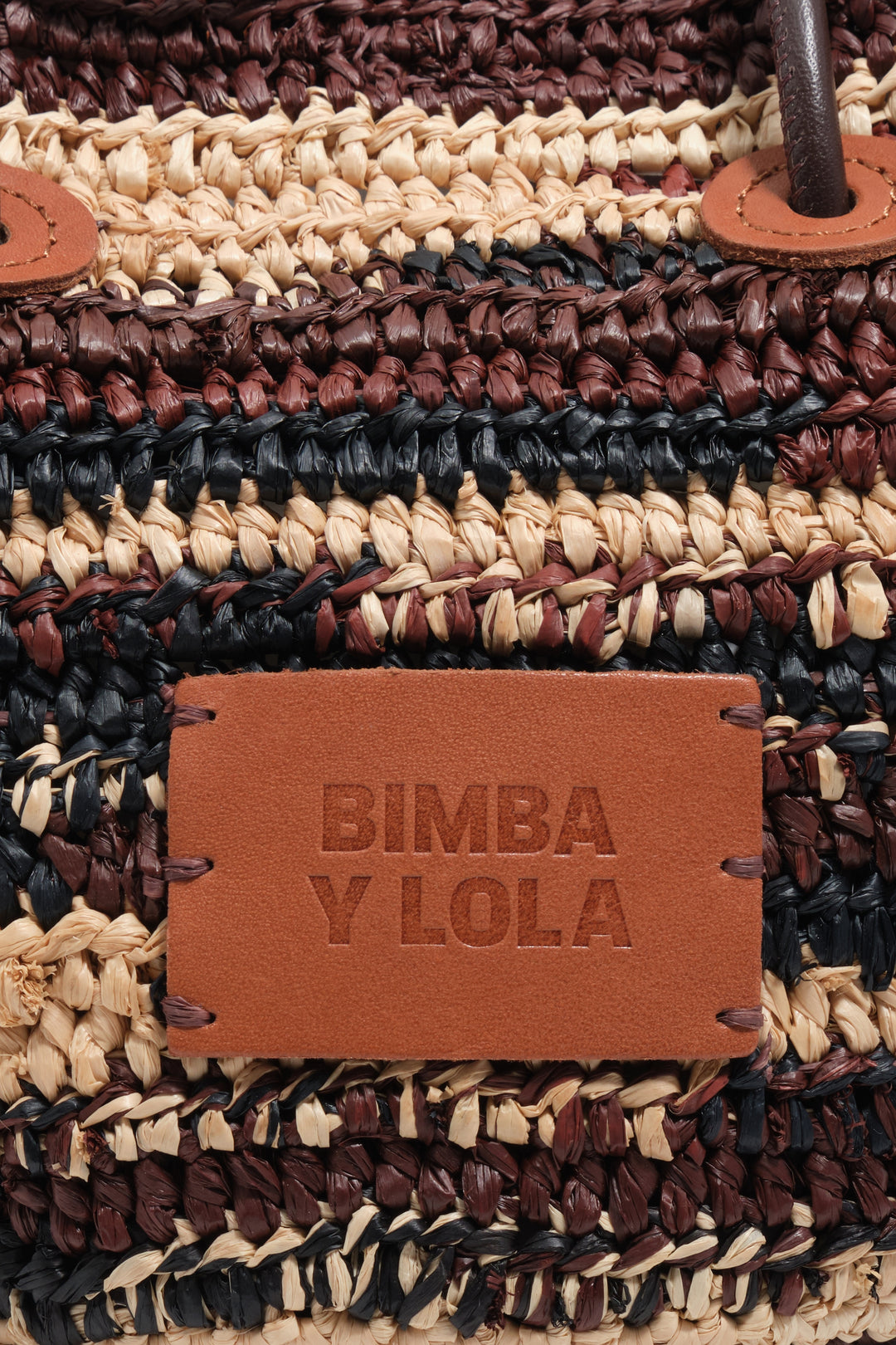 Small dark brown raffia basket bag