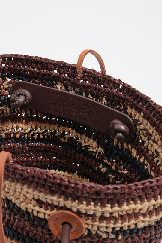 Small dark brown raffia basket bag