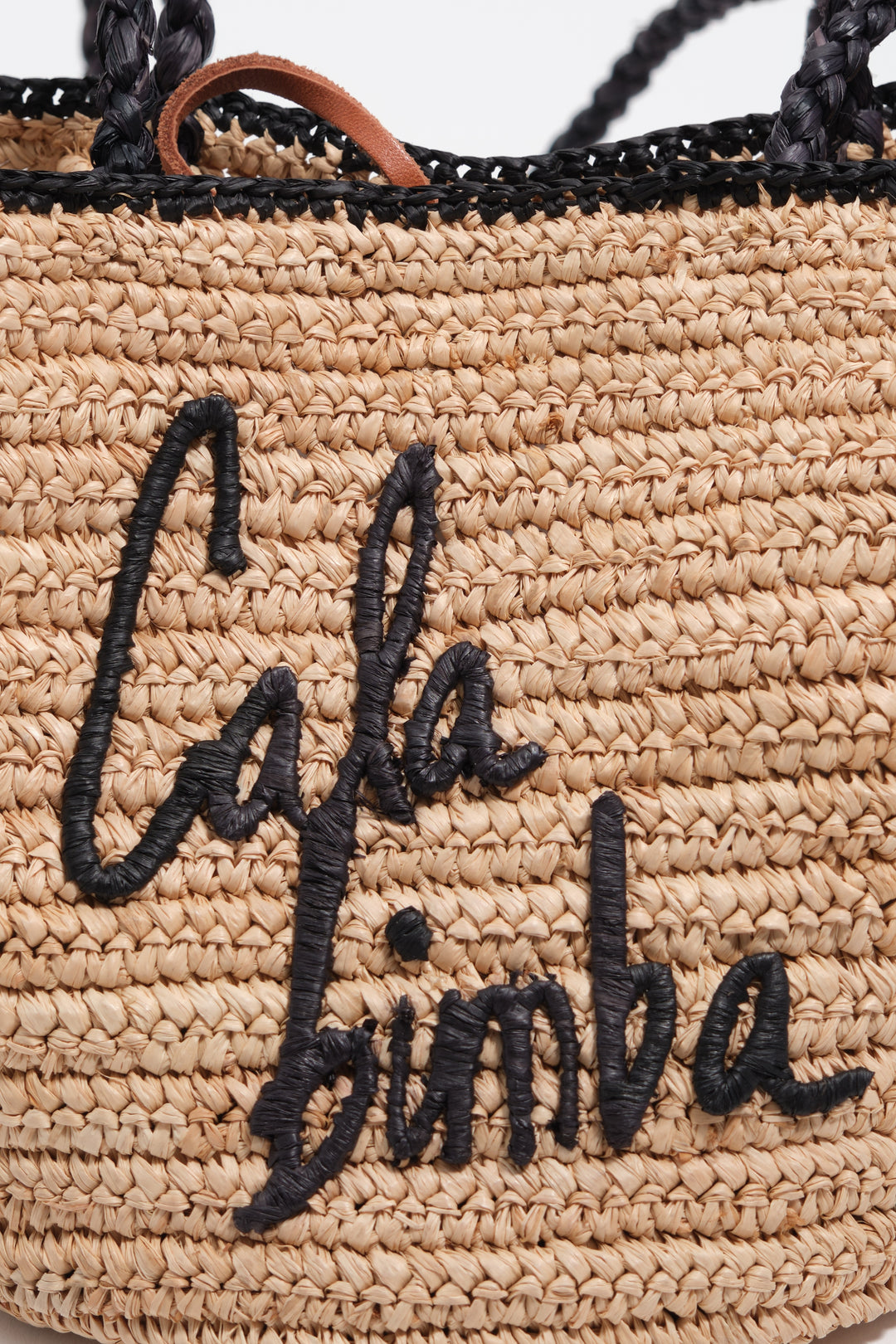 Small natural raffia basket bag