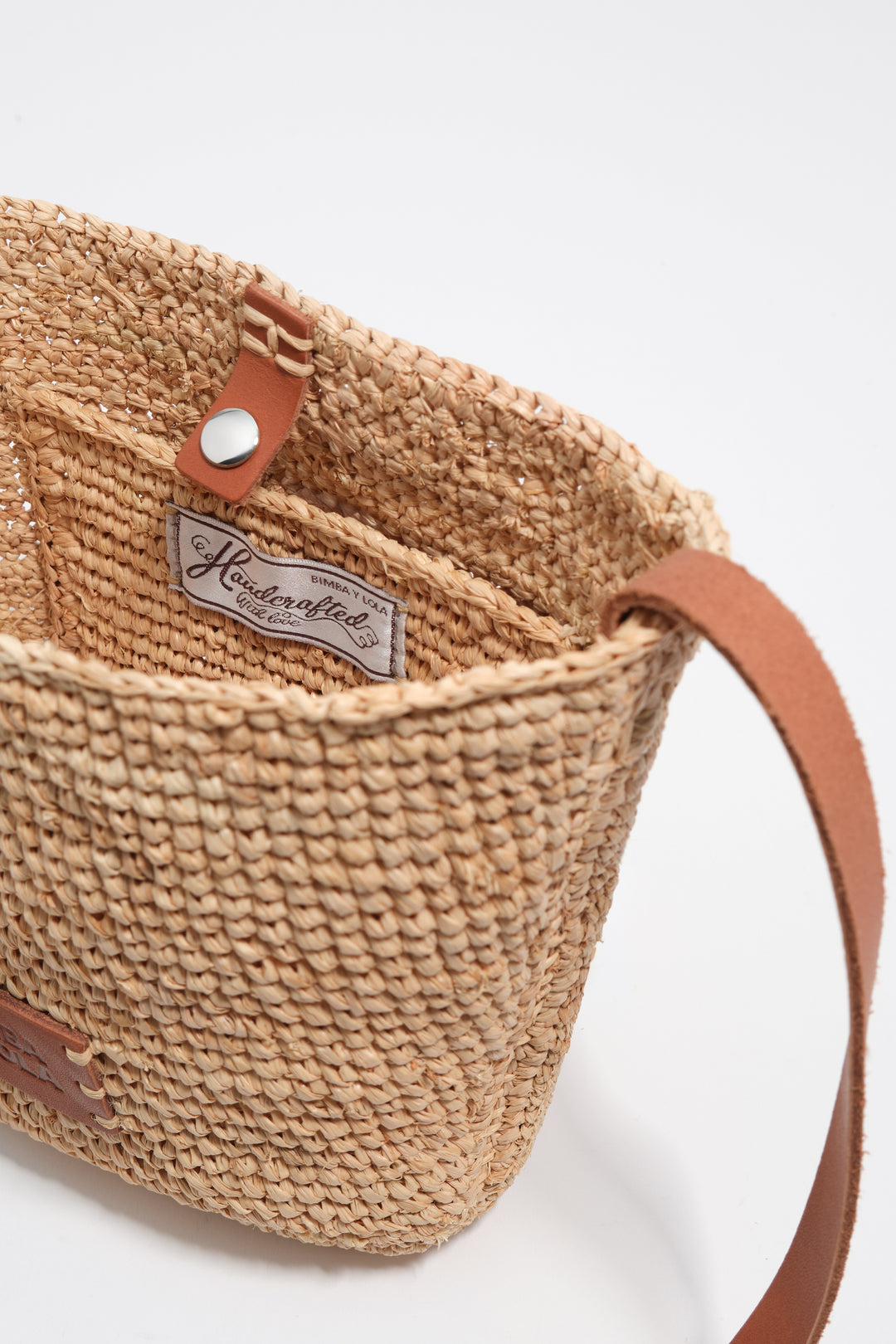 Small natural raffia plaited bag