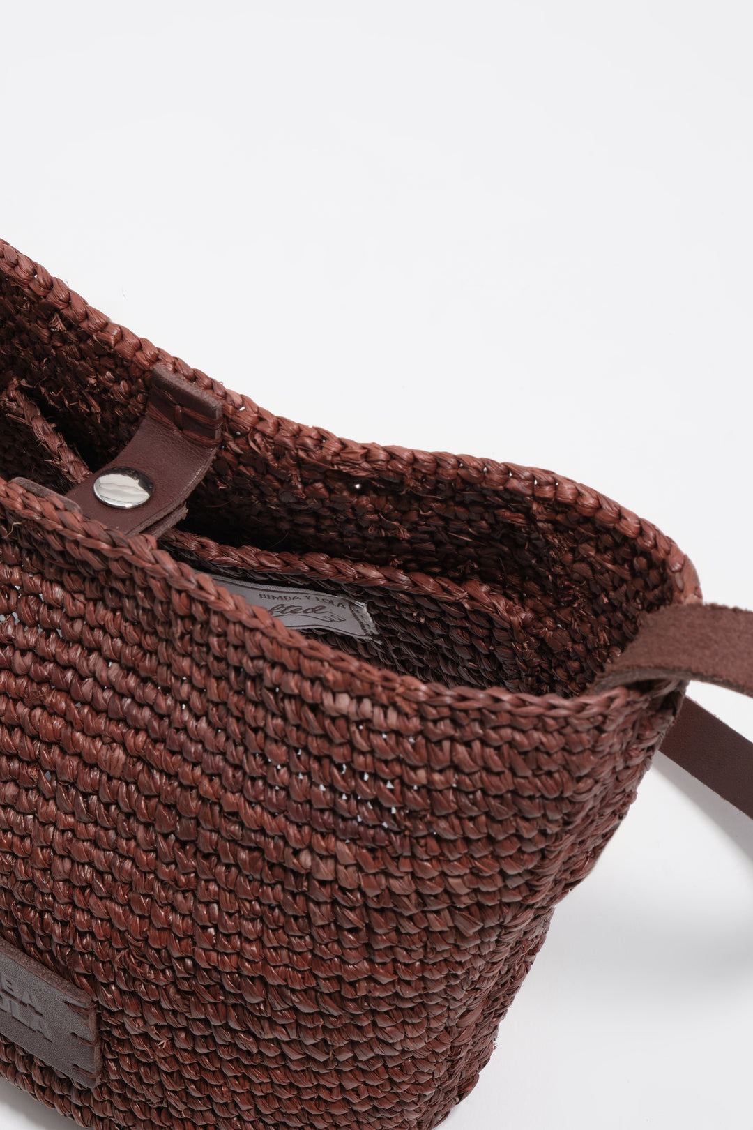 Small walnut raffia plaited bag