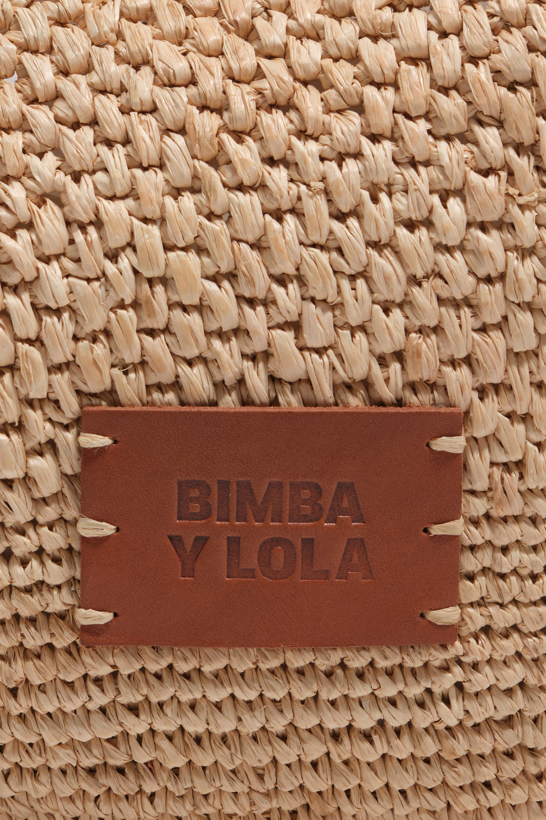 Large natural raffia plaited bag