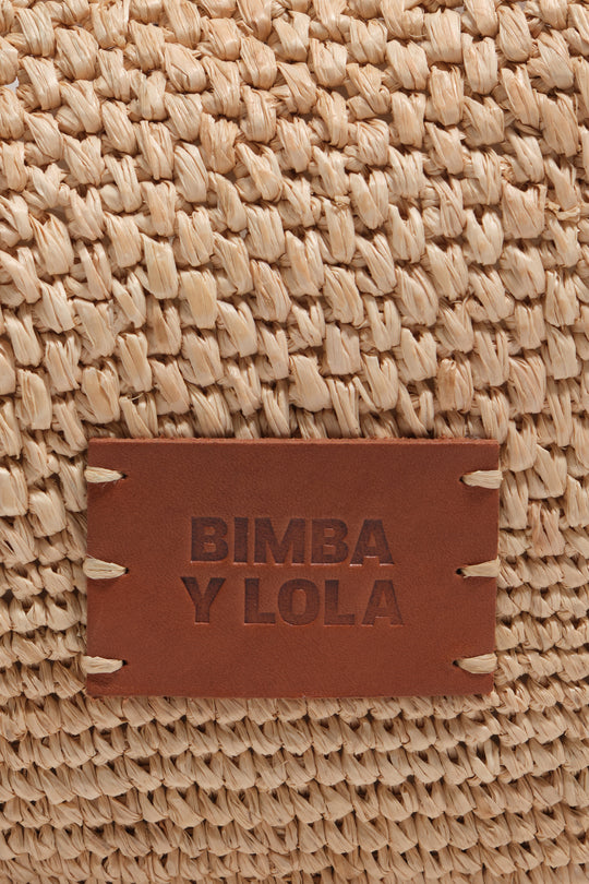 Large natural raffia plaited bag