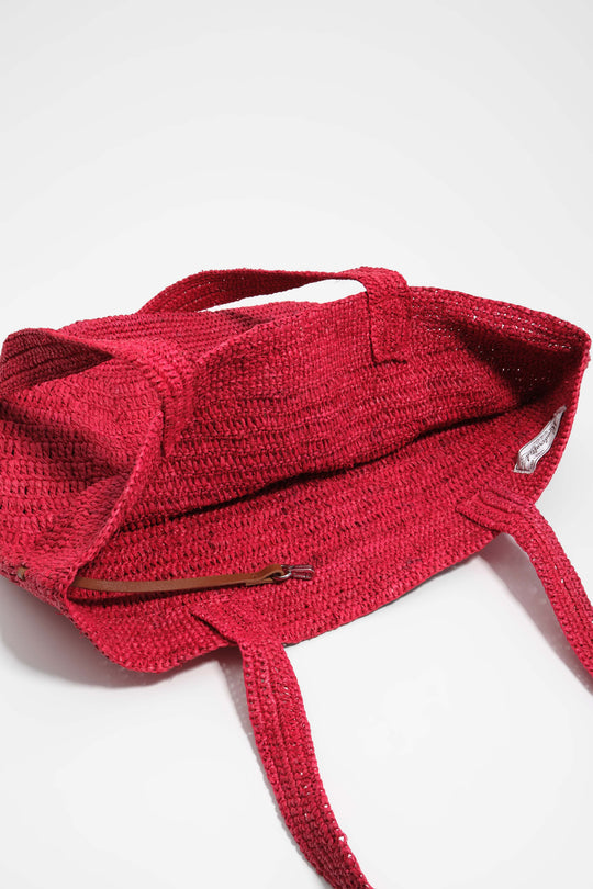 Large red plaited bag