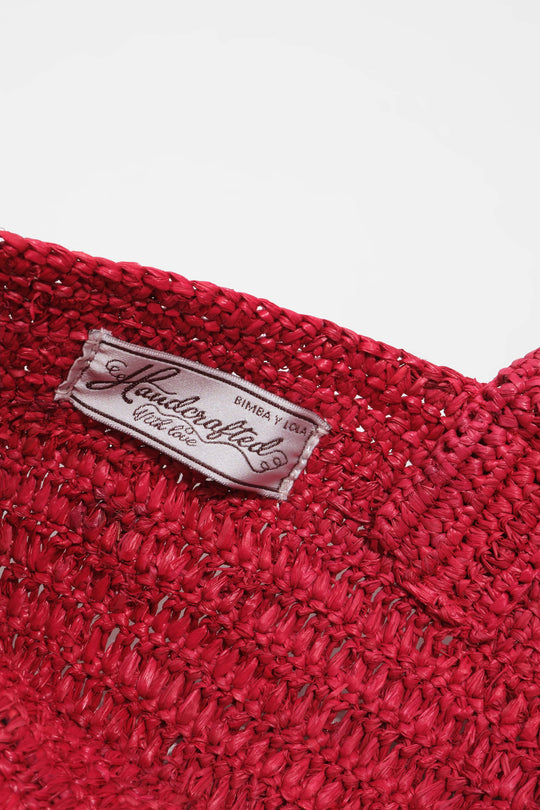 Large red plaited bag