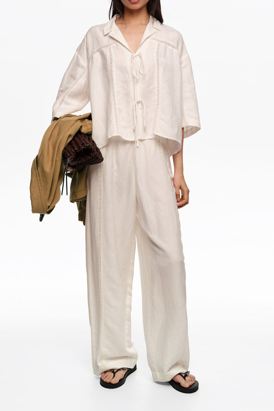 White linen shirt with ties and lace
