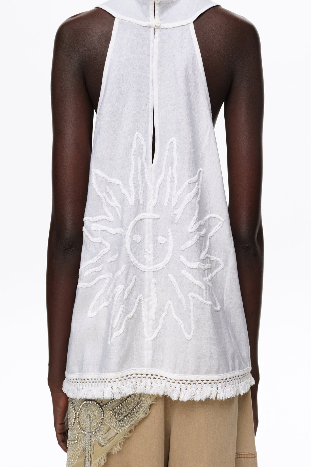 White fringed wrap top