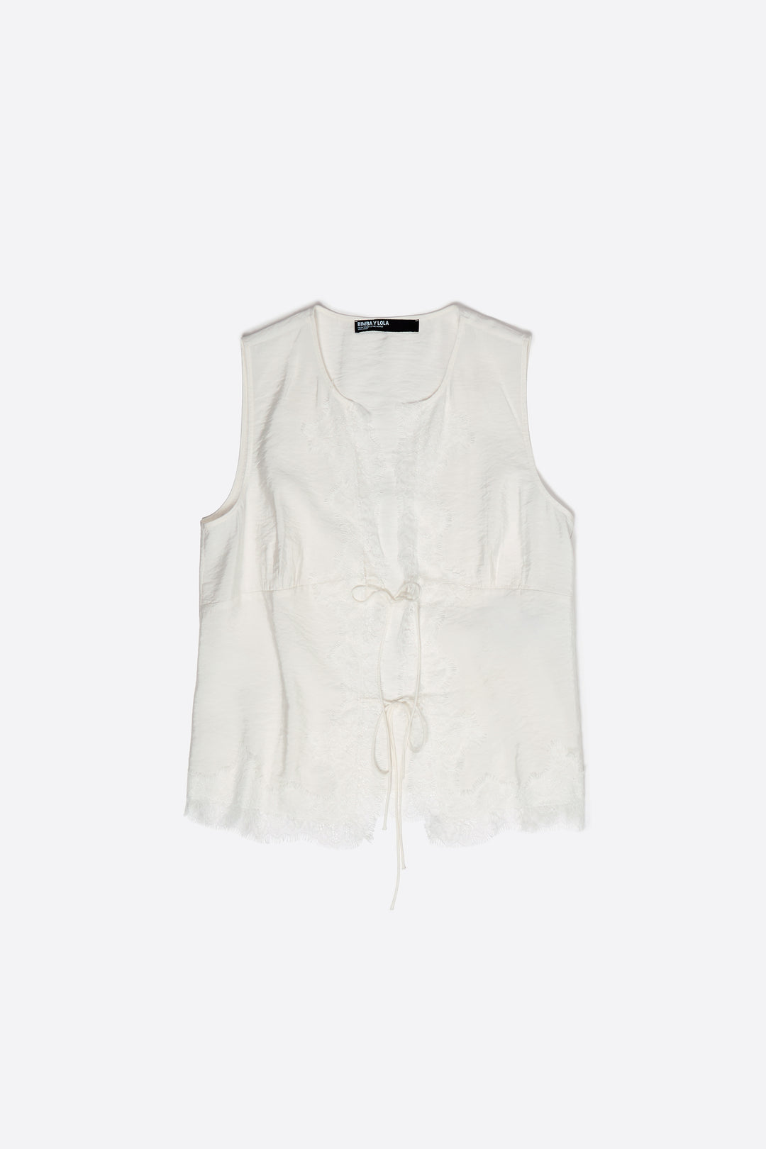White short-sleeve shirt with lace and ties